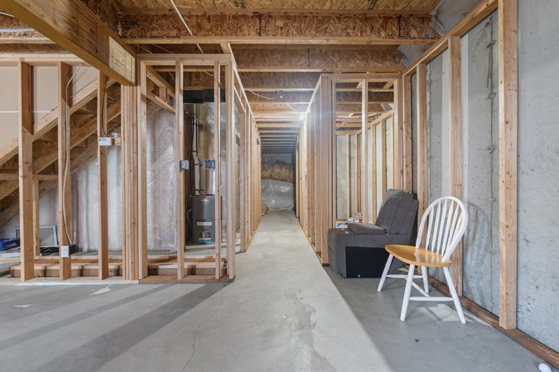 Unfinished basement, storage corridor